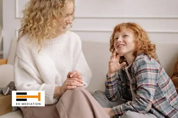 Happy mother and child after sorting child arrangements mediation Eccles